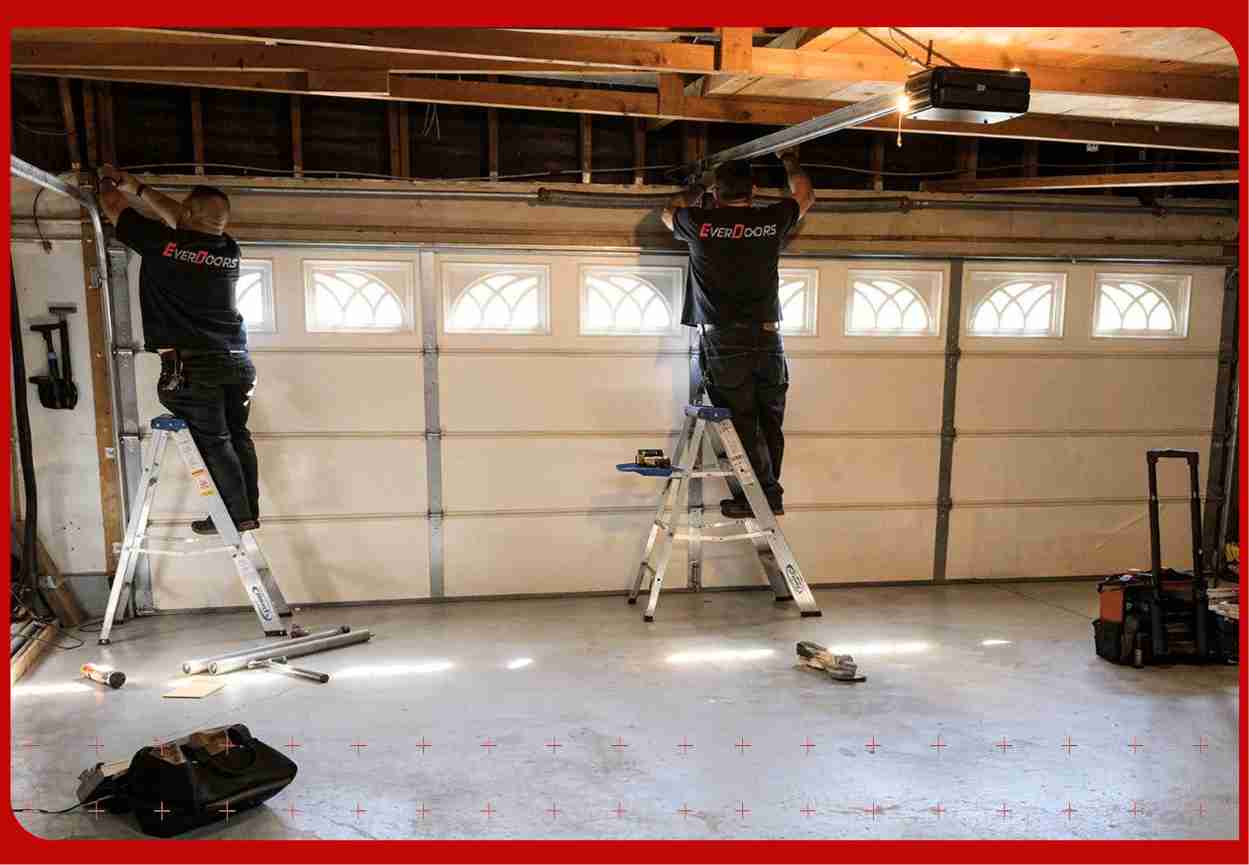 Everdoors-Garage-Door-Workers-Fixing-A-Garage-Door-On-The-Inside (1)