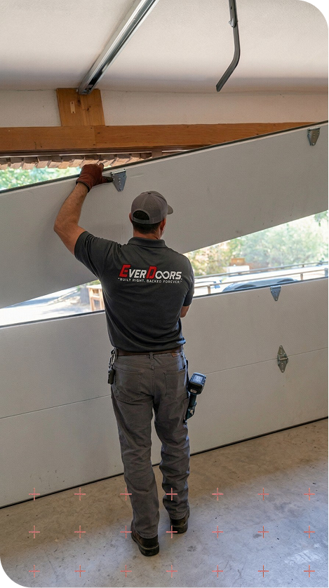 Everdoors worker working on a garage door